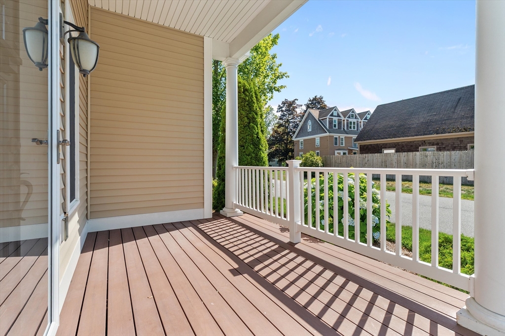 4 Emerald Way, Unit 4 Salisbury, MA 01952 - Photo 5 of 40 a view of a balcony with wooden floor