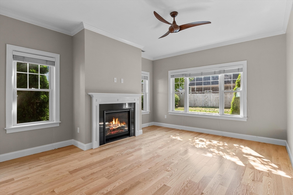 4 Emerald Way, Unit 4 Salisbury, MA 01952 - Photo 8 of 40 a view of an empty room with window and a fireplace