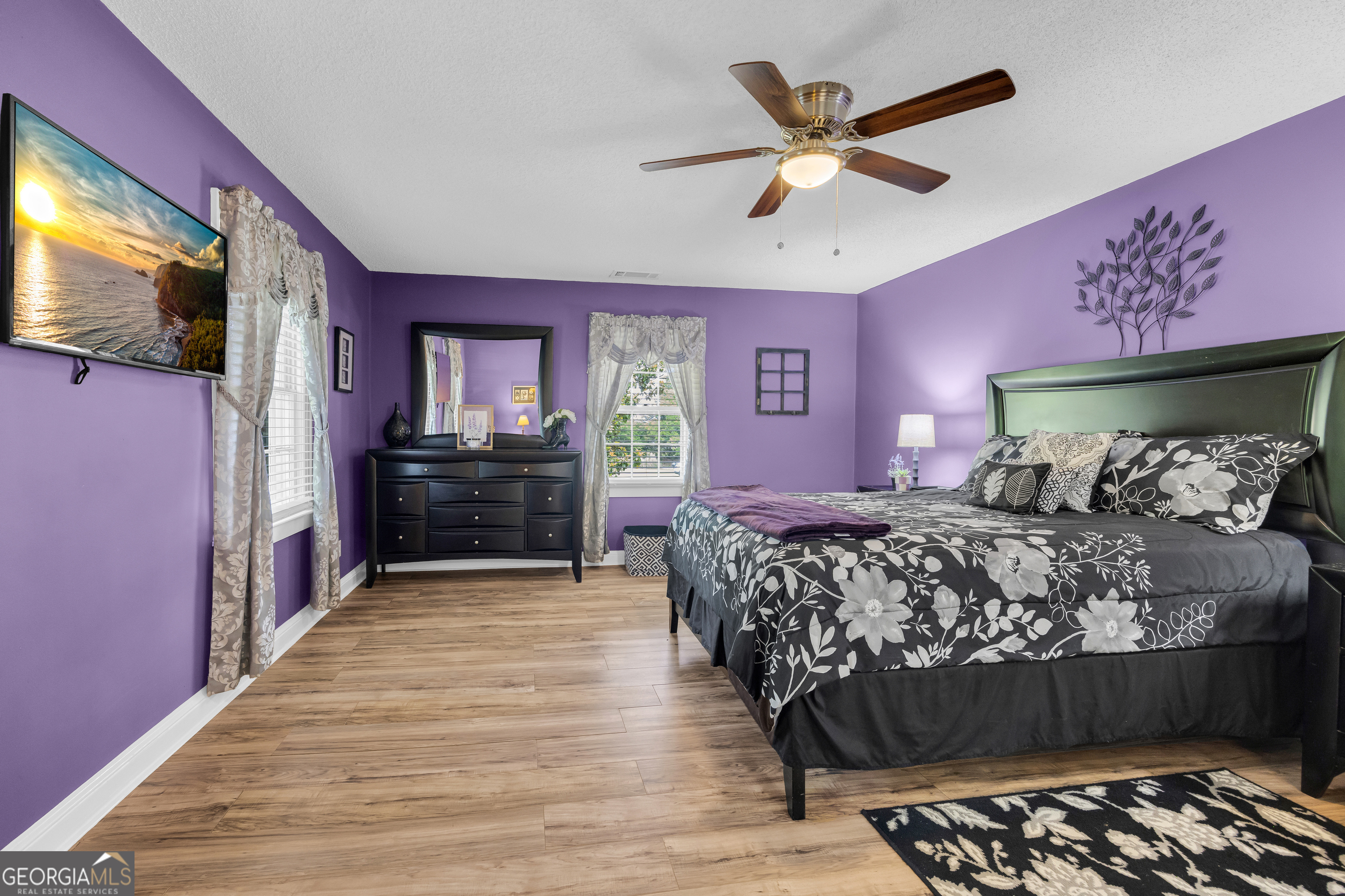 1270 Airline-Goldmine Road Canon, GA 30520 - Photo 66 of 107 a bedroom with a bed and a flat screen tv