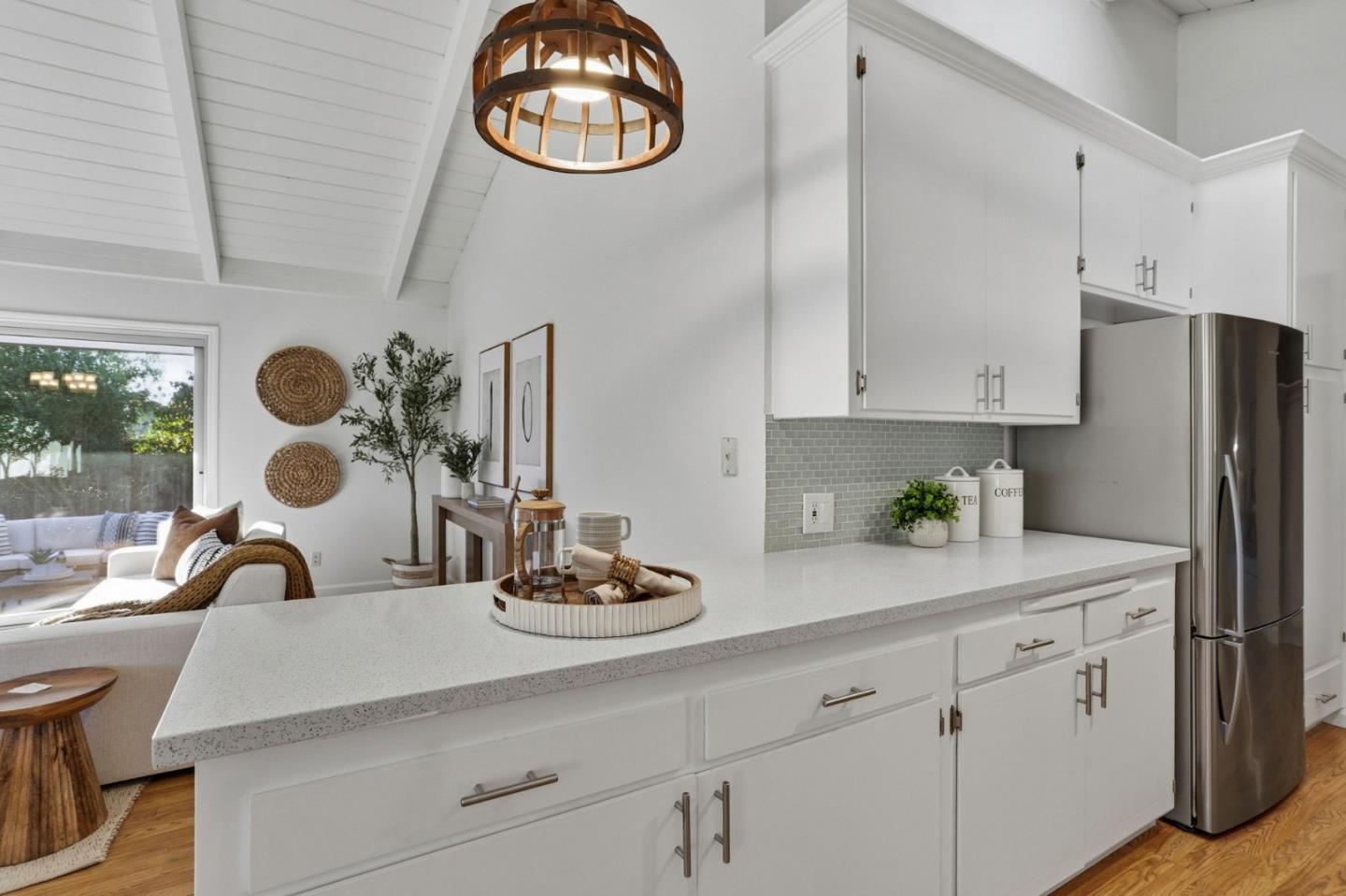 2119 Burr Court Santa Cruz, CA 95062 - Photo 16 of 38 a kitchen with a sink cabinets and window