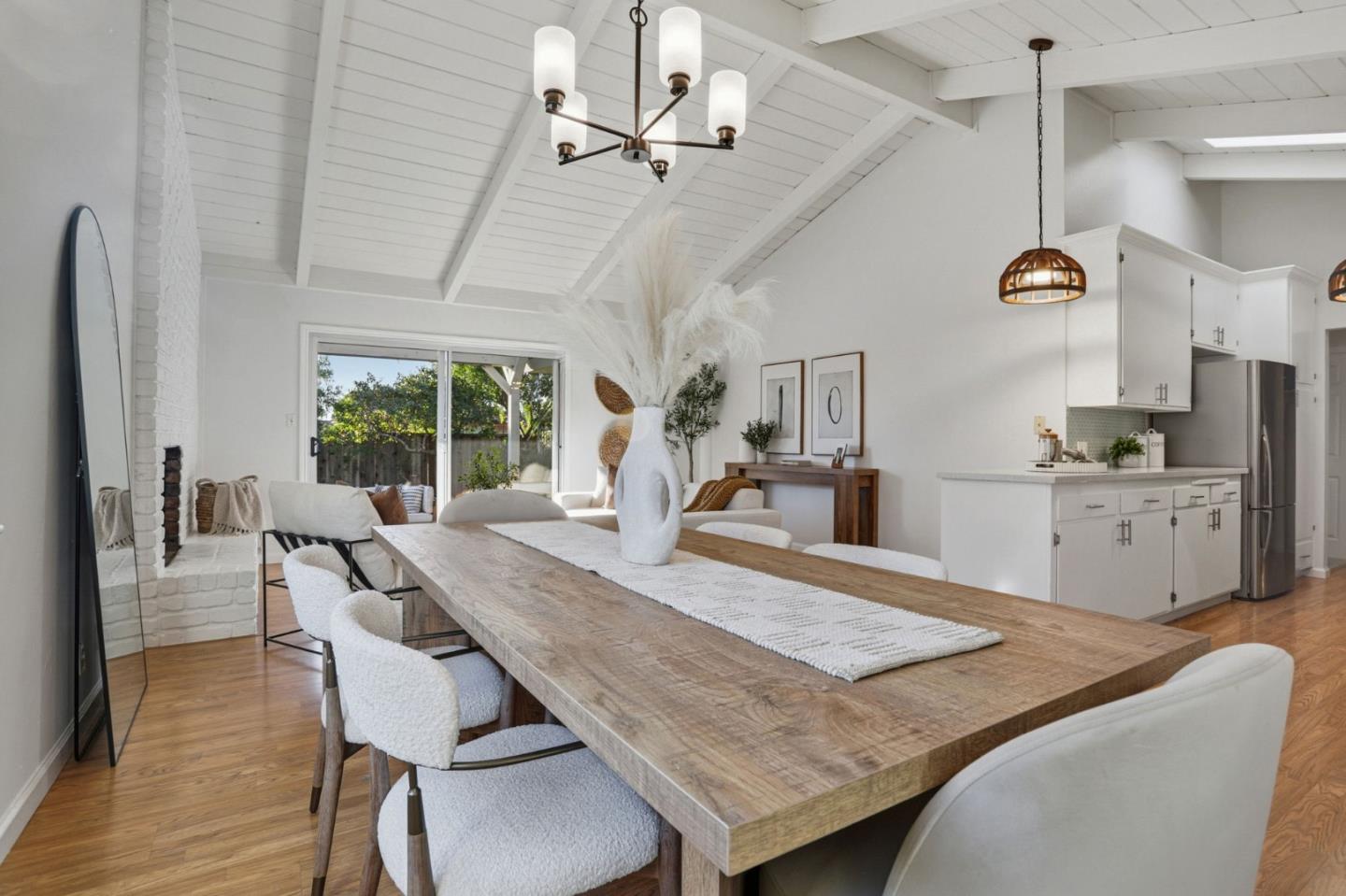 2119 Burr Court Santa Cruz, CA 95062 - Photo 18 of 38 a view of a dining room with furniture and a chandelier