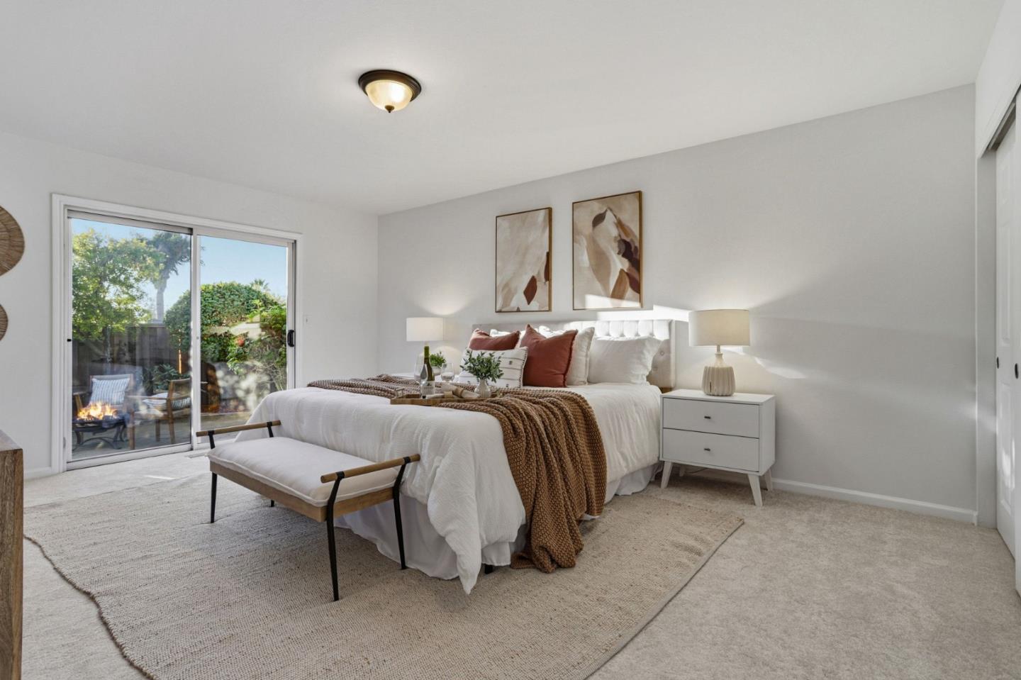 2119 Burr Court Santa Cruz, CA 95062 - Photo 23 of 38 a bed room with a bed and a lamp