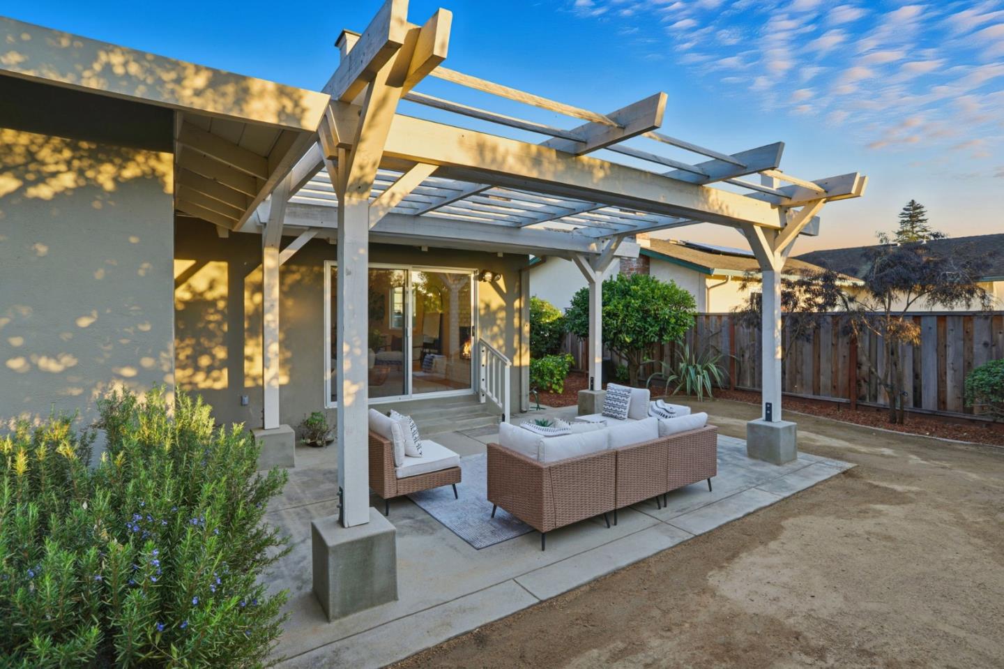 2119 Burr Court Santa Cruz, CA 95062 - Photo 35 of 38 a view of a patio with table and chairs potted plants