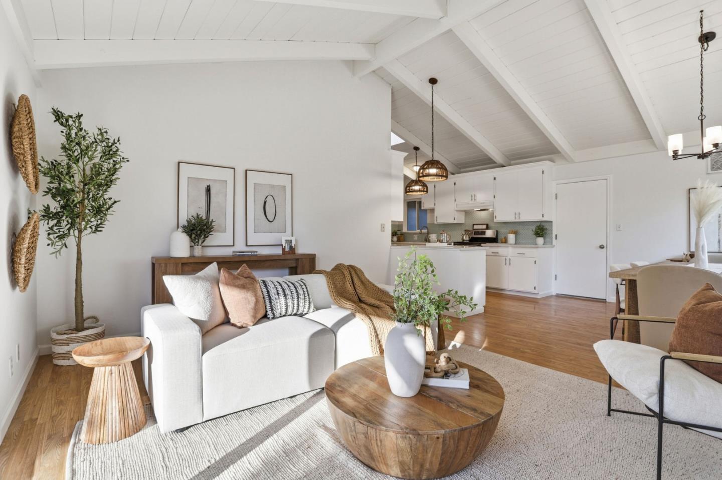 2119 Burr Court Santa Cruz, CA 95062 - Photo 8 of 38 a living room with kitchen island furniture and a chandelier