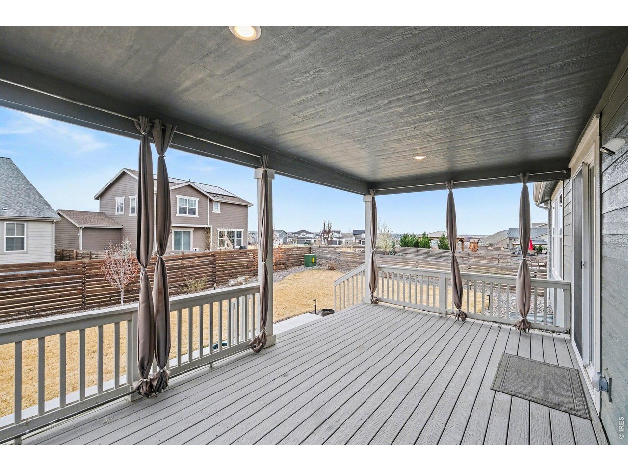 5258 Inland Avenue Firestone, CO 80504 - Photo 41 of 44 Covered Deck in Back
