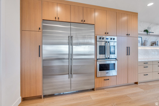 3918 South Mapleton Ests Drive Mapleton, UT 84664 - Photo 25 of 103 Kitchen with stainless steel appliances, light wood finish cabinets, light wood-style floors, open shelves, and recessed lighting