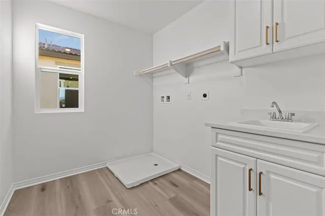 a bathroom with a sink toilet a bathtub and a shower