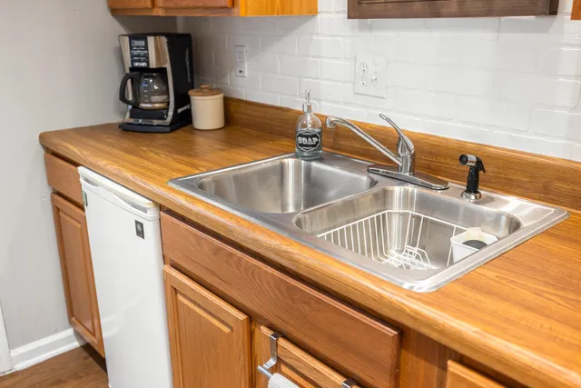 an aerial view of house with yard