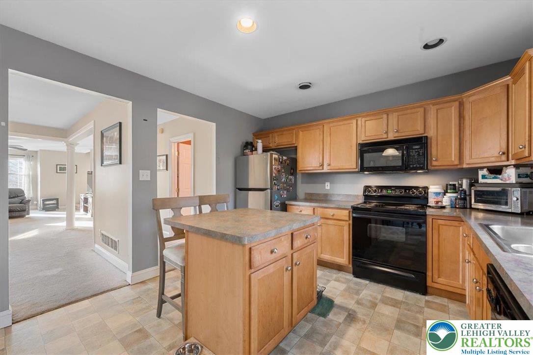 1409 Ravena Street Bethlehem, PA 18015 - Photo 11 of 40 a kitchen with a sink stove and refrigerator