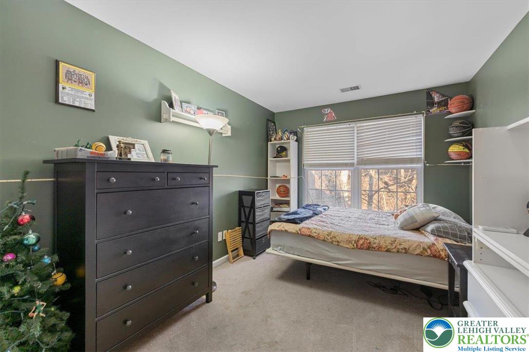 1409 Ravena Street Bethlehem, PA 18015 - Photo 22 of 40 a bedroom with a bed and window