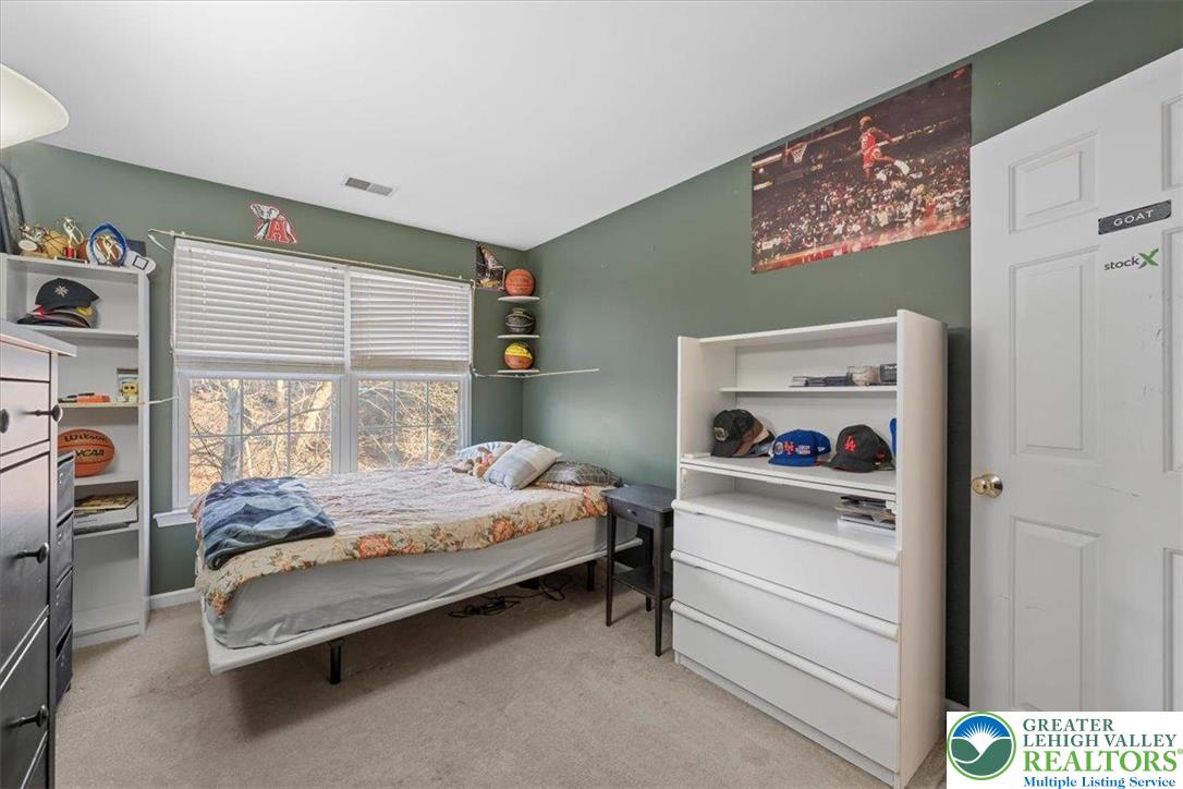 1409 Ravena Street Bethlehem, PA 18015 - Photo 23 of 40 a bedroom with a bed and a window