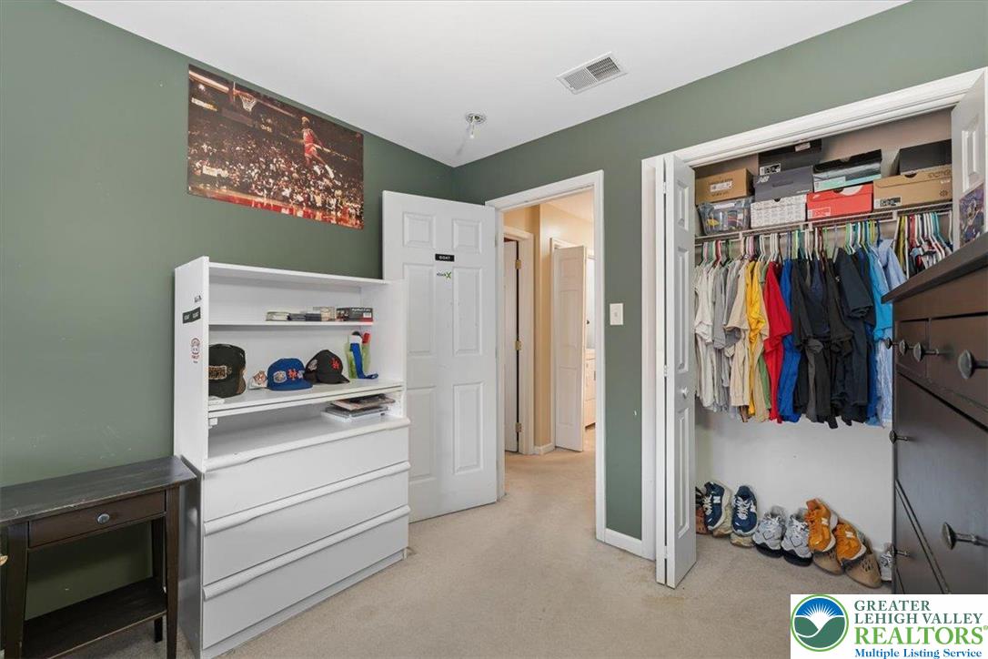 1409 Ravena Street Bethlehem, PA 18015 - Photo 24 of 40 a view of walk in closet with clothes and shoes