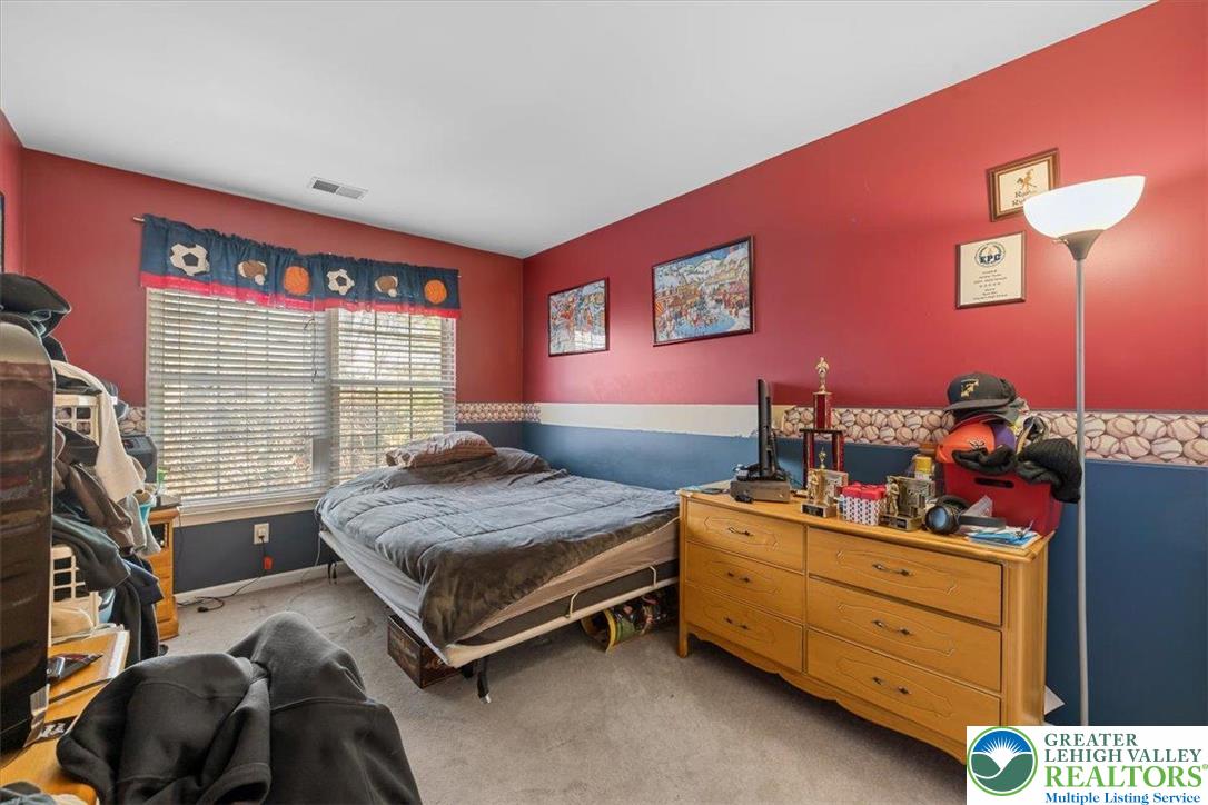 1409 Ravena Street Bethlehem, PA 18015 - Photo 25 of 40 a bedroom with a bed and a window