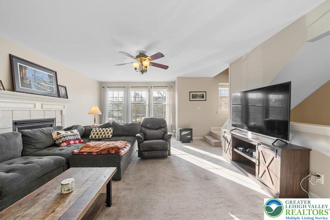 1409 Ravena Street Bethlehem, PA 18015 - Photo 6 of 40 a living room with furniture and a flat screen tv