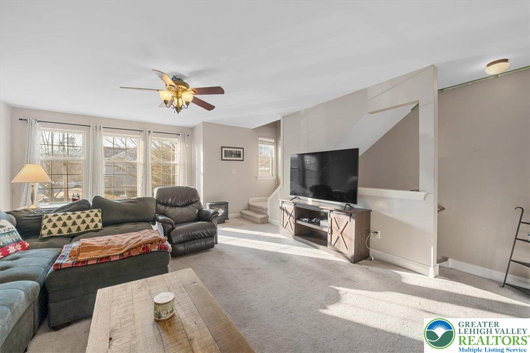 1409 Ravena Street Bethlehem, PA 18015 - Photo 7 of 40 a living room with furniture and a flat screen tv