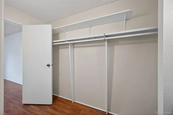 a view of an empty walk in closet