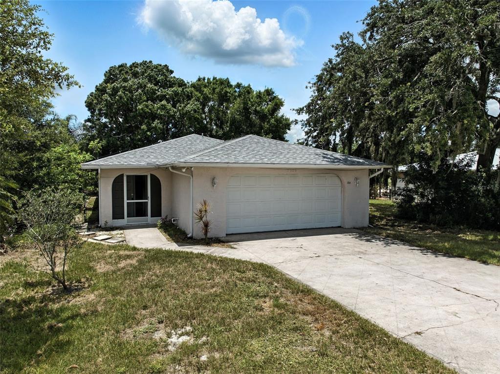 a house with trees in the background