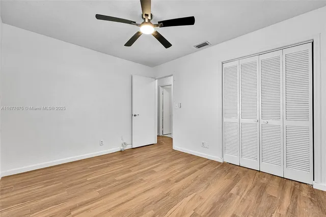 a view of a glass door with a balcony