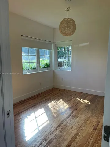 a view of an empty room and window