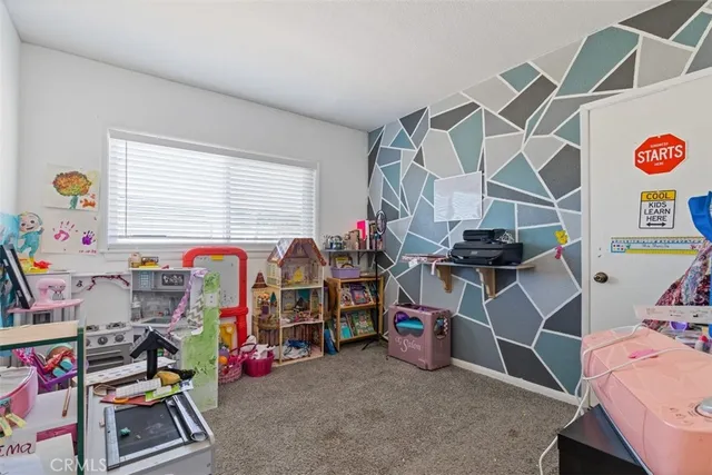 a bed room with furniture and a bed