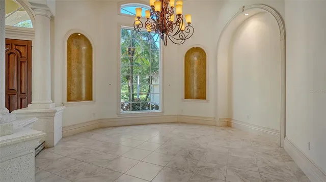 a kitchen with granite countertop a stove and a sink