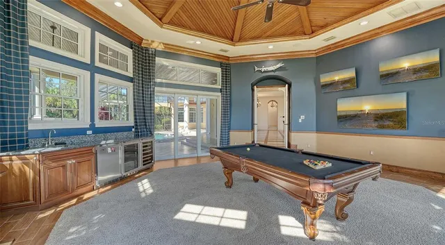 a view of walk in closet and bedroom