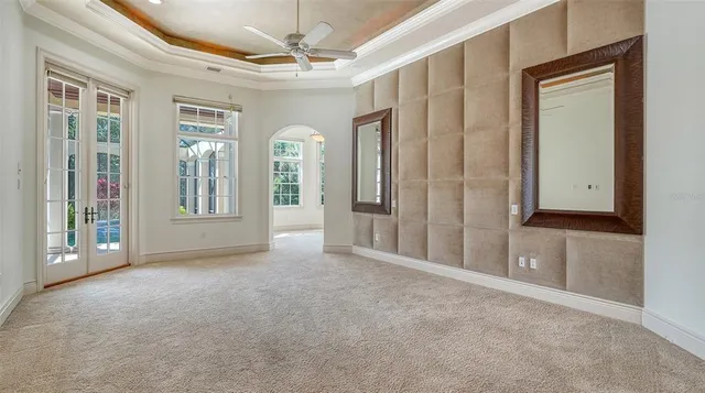 a view of a house with backyard porch and sitting area