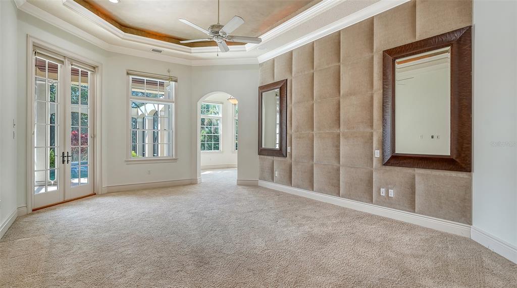 3218 Signet Court Sarasota, FL 34240 - Photo 34 of 82 wooden floor and windows in an empty room