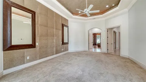 a view of a swimming pool with a porch