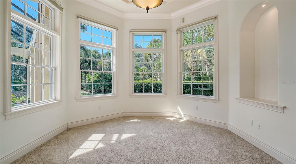 3218 Signet Court Sarasota, FL 34240 - Photo 36 of 82 a view of an empty room with a window