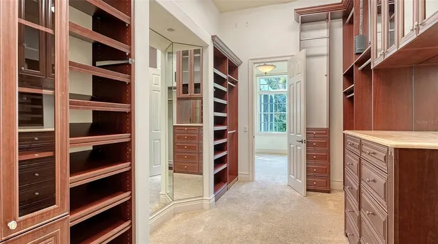 an aerial view of residential houses with outdoor space and street view