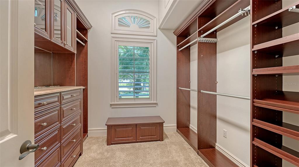 3218 Signet Court Sarasota, FL 34240 - Photo 43 of 82 a view of walk in closet and bedroom