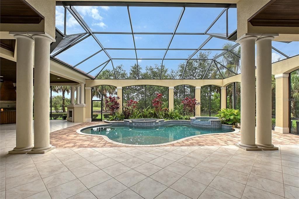 3218 Signet Court Sarasota, FL 34240 - Photo 56 of 82 a view of a house with backyard porch and sitting area