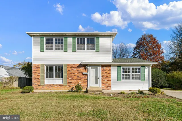 a big house with a big yard and more windows