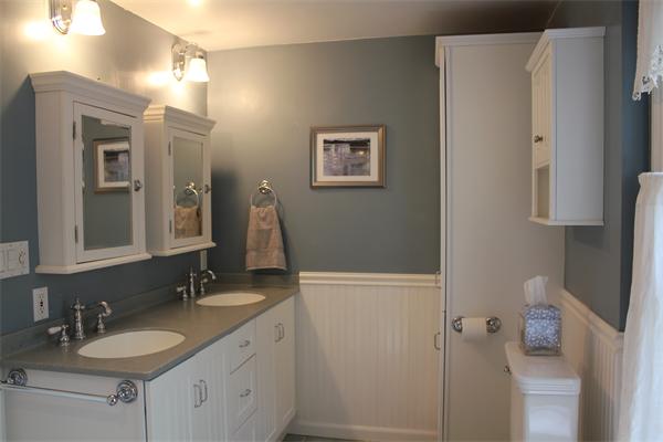 51 Grove Road Natick, MA 01760 - Photo 5 of 18 a bathroom with a granite countertop sink and a mirror