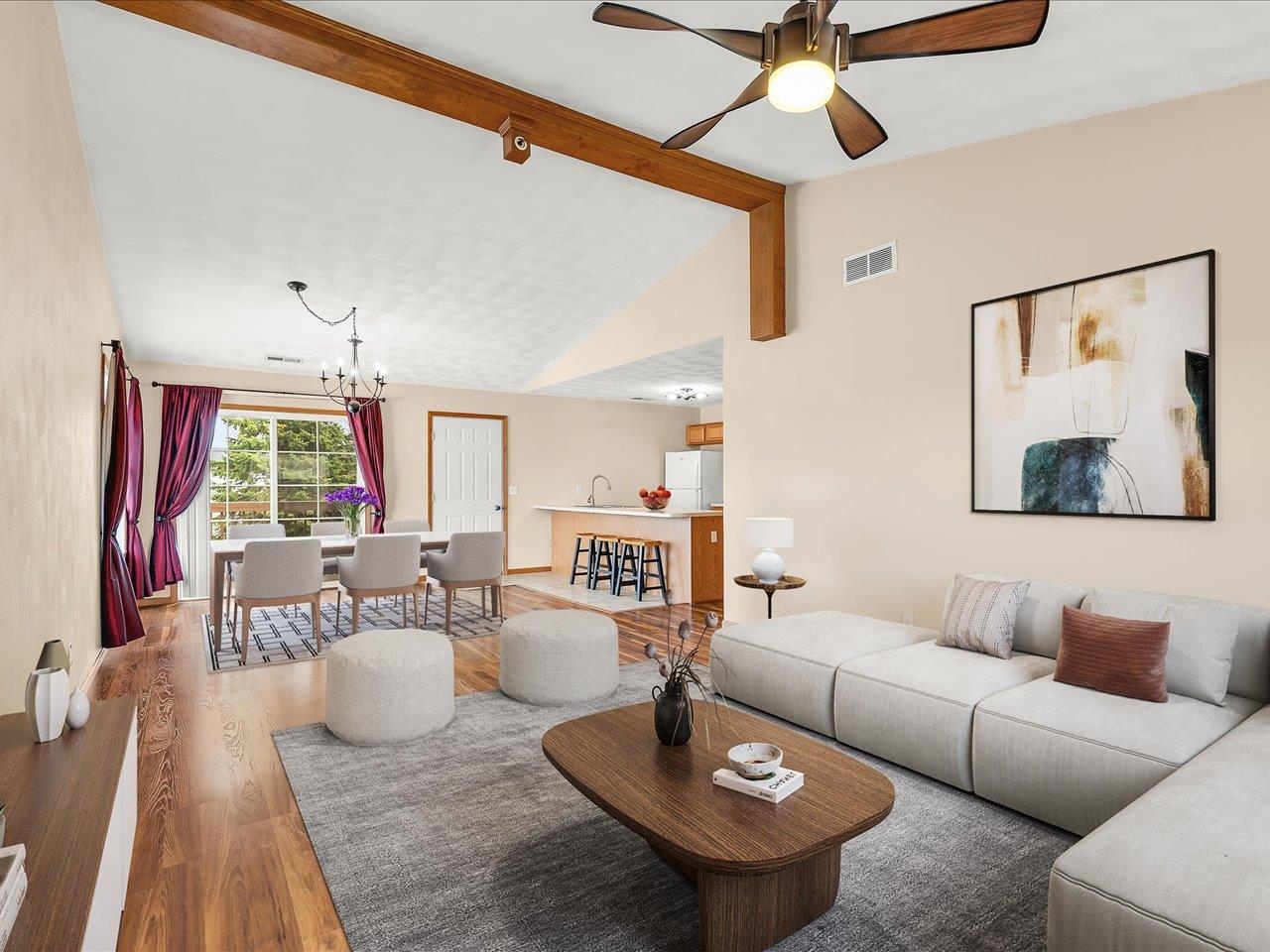 10184 Metalmark Lane Roscoe, IL 61073 - Photo 11 of 29 a living room with furniture and a chandelier