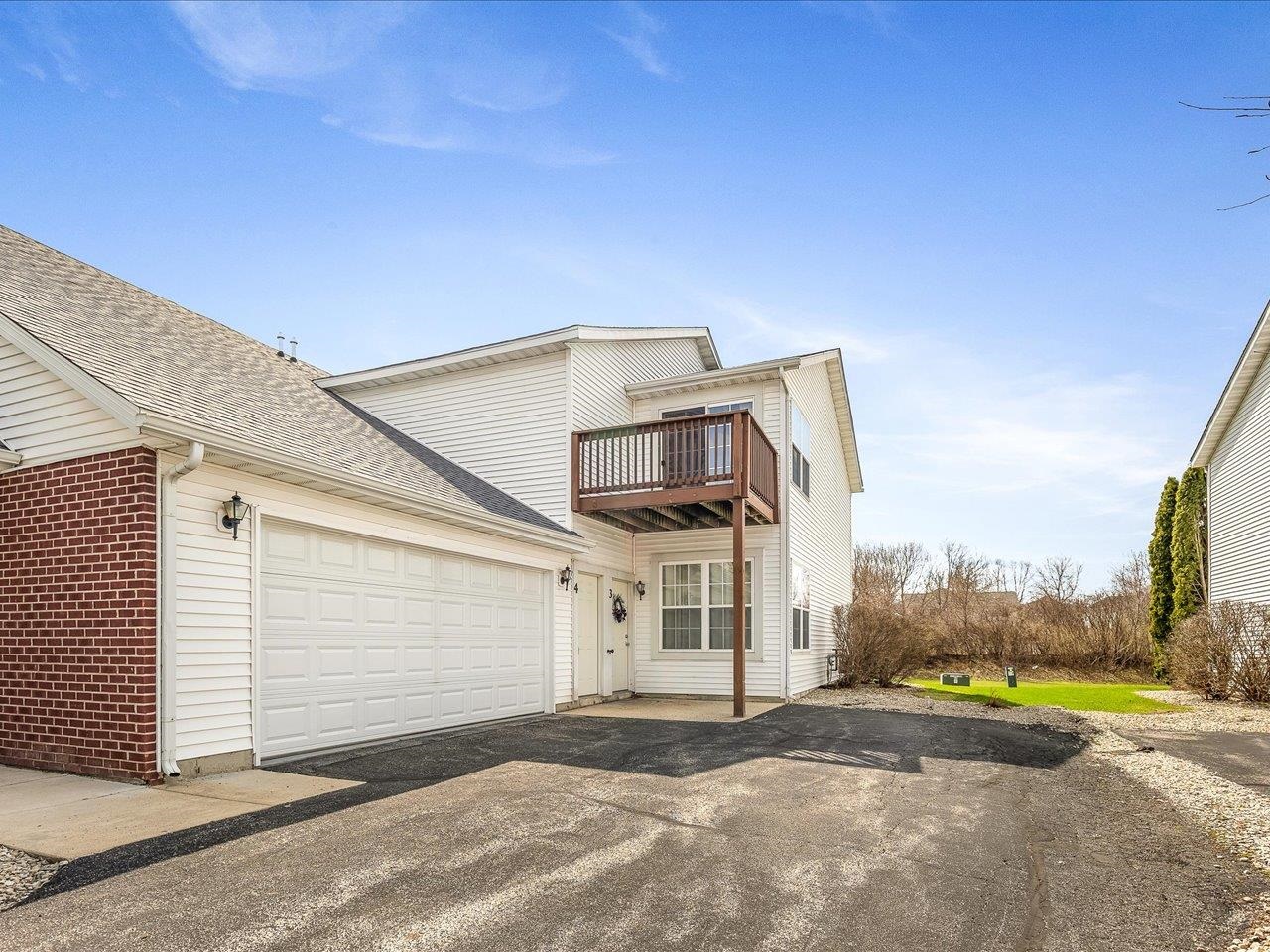 10184 Metalmark Lane Roscoe, IL 61073 - Photo 2 of 29 a view of a house with a street