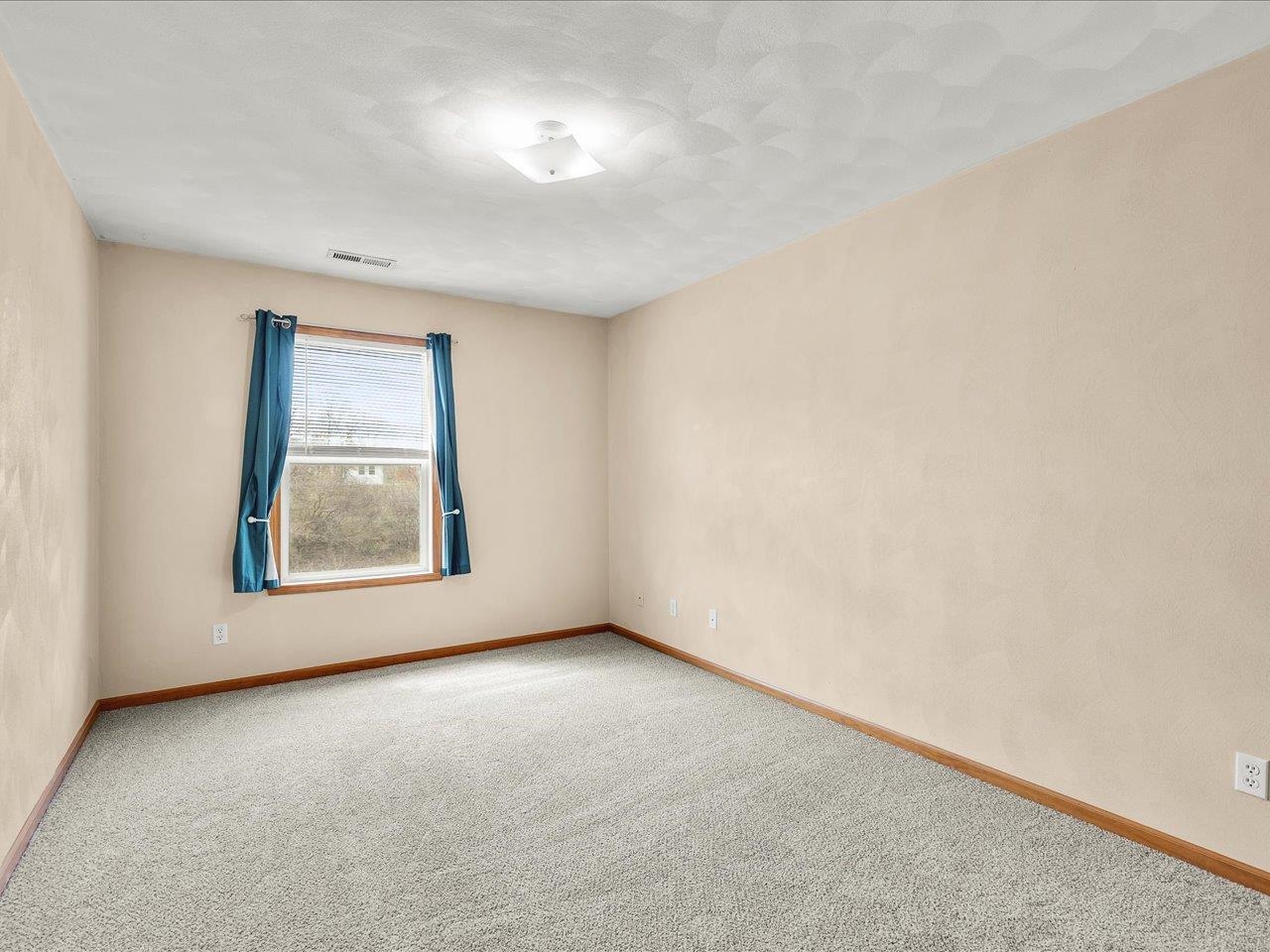 10184 Metalmark Lane Roscoe, IL 61073 - Photo 22 of 29 an empty room with a window