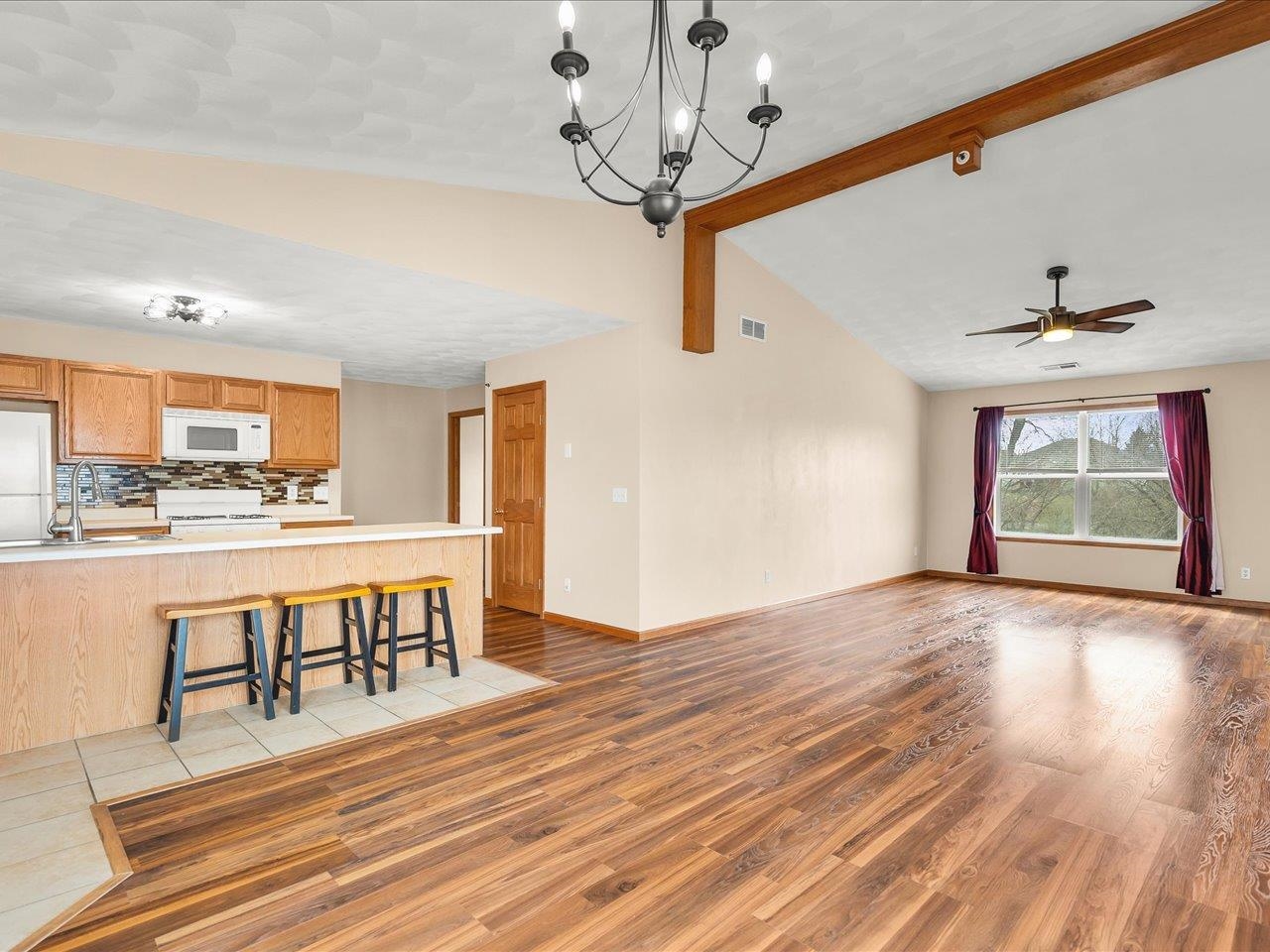 10184 Metalmark Lane Roscoe, IL 61073 - Photo 3 of 29 a view of a kitchen and dining room
