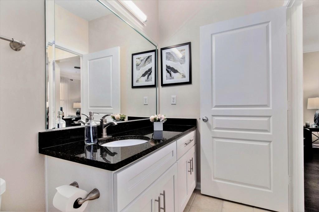 10 Perimeter Summit Boulevard, Unit 2112 Atlanta, GA 30319 - Photo 24 of 40 a kitchen with a sink and cabinets