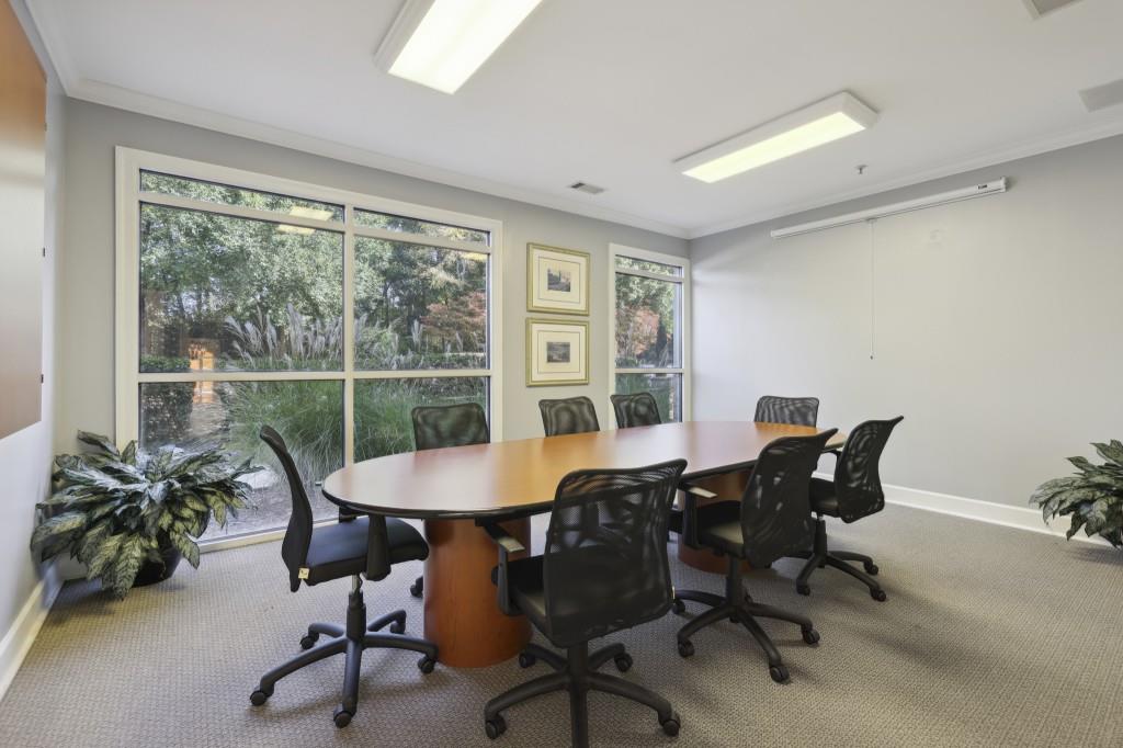 10 Perimeter Summit Boulevard, Unit 2112 Atlanta, GA 30319 - Photo 37 of 40 a view of a dining room with furniture window and outside view