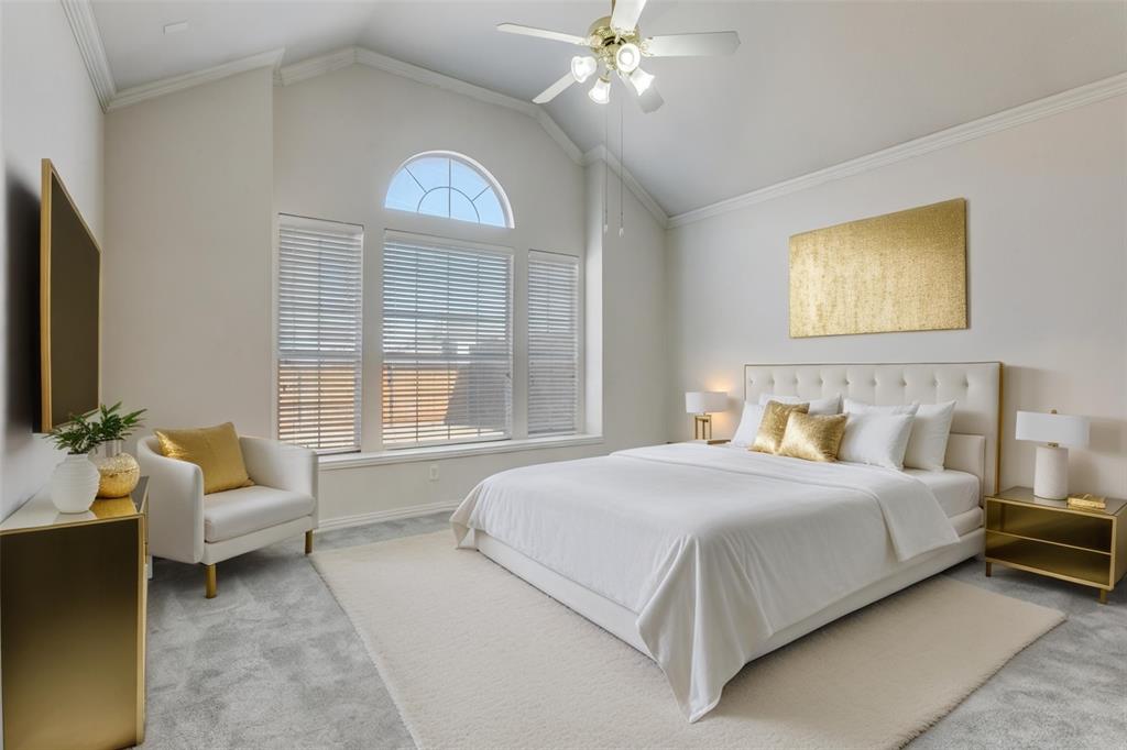 511 Poplar Lane Irving, TX 75063 - Photo 14 of 30 Carpeted bedroom with crown molding and a ceiling fan