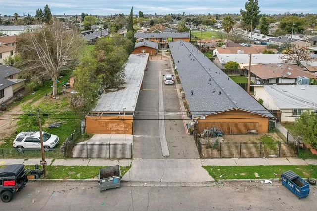 an aerial view of a house with a garden