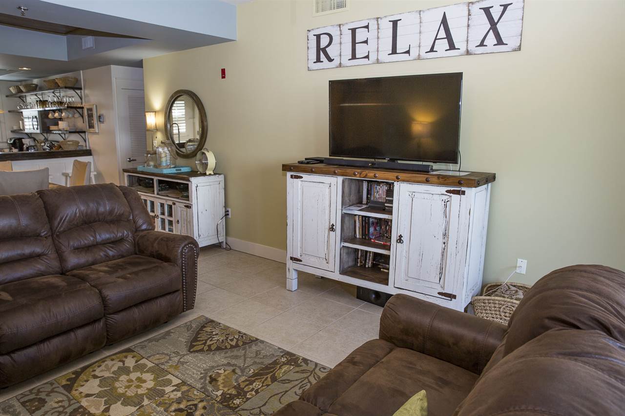 815 Plantation Road, Unit 401 Gulf Shores, AL 36542 - Photo 28 of 43 Living Room 2