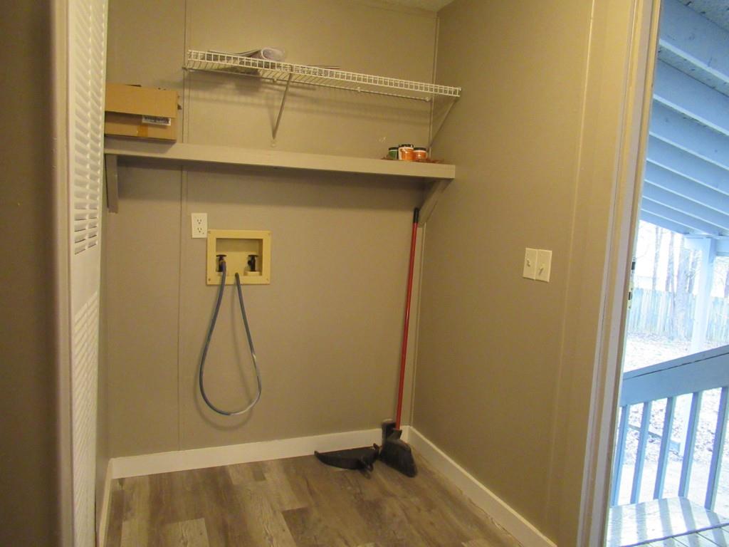 61 Berry Patch Lane Cleveland, GA 30528 - Photo 14 of 23 a bathroom with a granite countertop shower and a sink