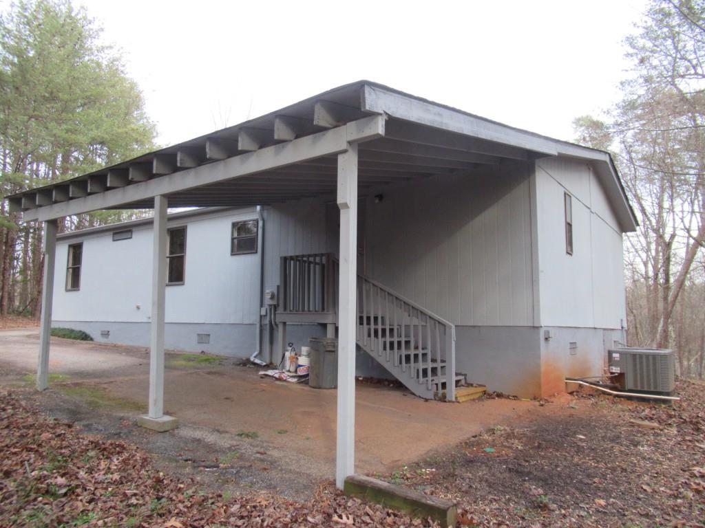61 Berry Patch Lane Cleveland, GA 30528 - Photo 7 of 23 a backyard of a house