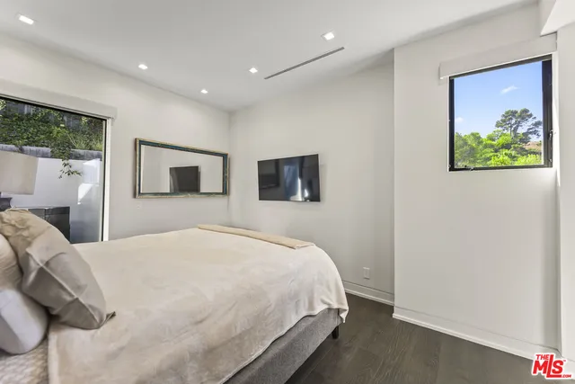 a bathroom with a sink double vanity and shower