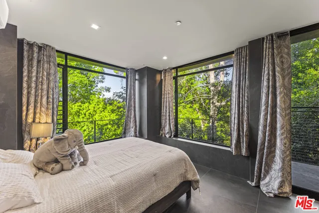 a view of a tree with a yard