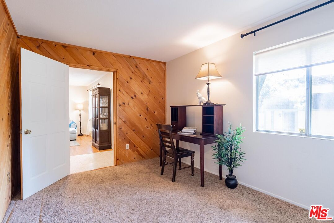 2567 Grambling Lane Riverside, CA 92507 - Photo 26 of 38 a living room with furniture and a window