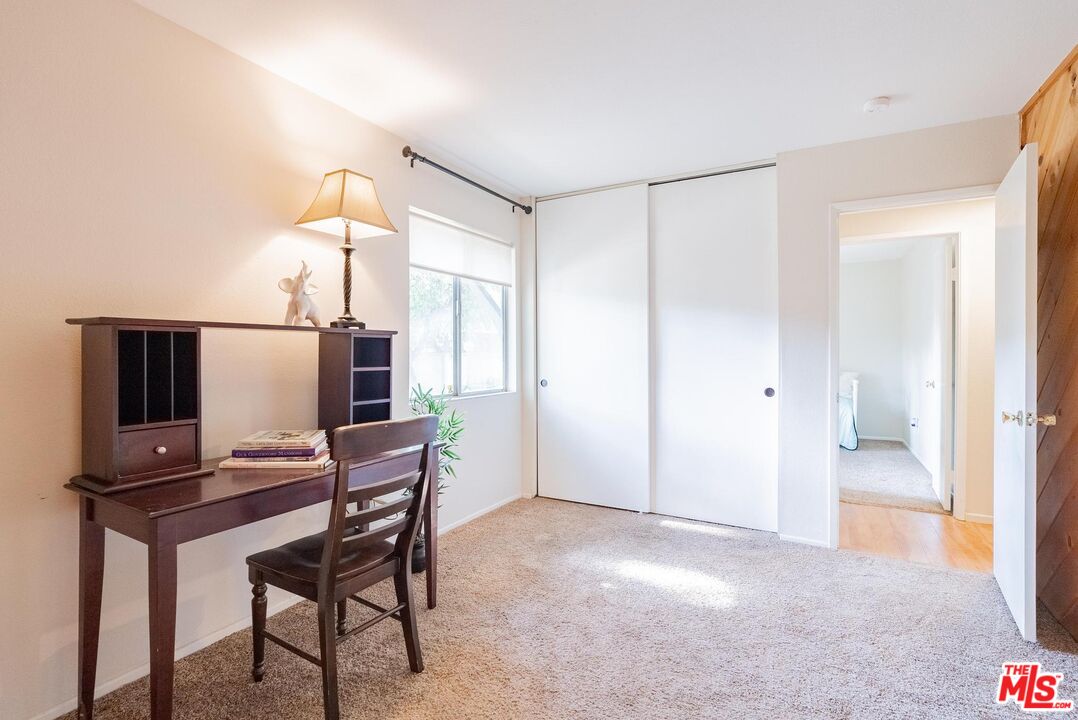 2567 Grambling Lane Riverside, CA 92507 - Photo 27 of 38 a view of workspace with a flat screen tv